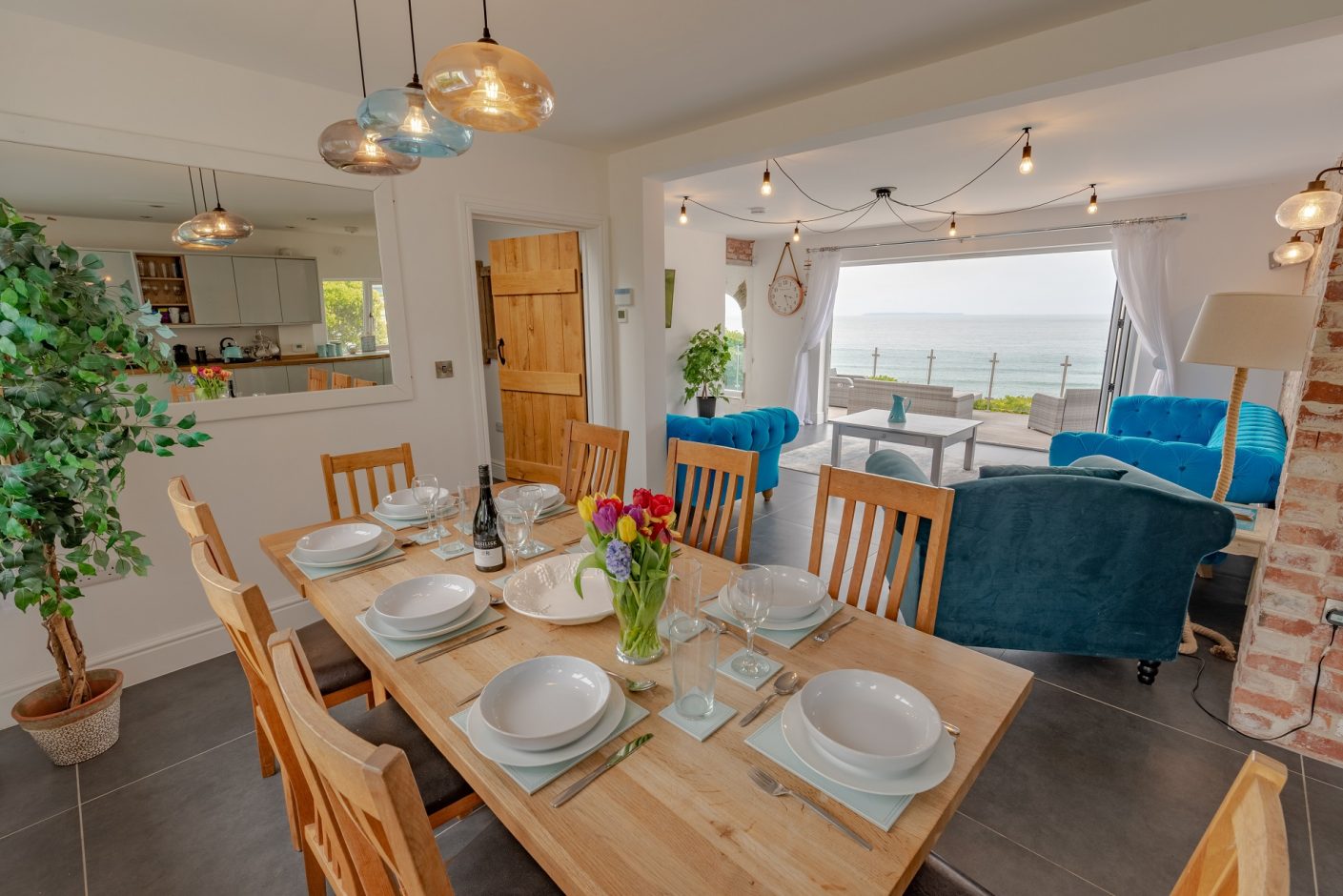 Lounge with view of Woolacombe beach from Luxury Holiday Home White Cottage